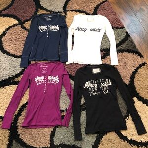AéRopostale. Size Medium. All 4 long sleeve henley tops.